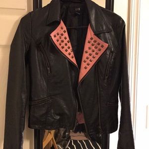 Pink studded black leather jacket!